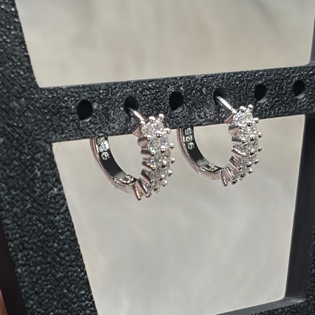 Sterling Silver Huggie Earrings With Rows Of Cubic Zirconias